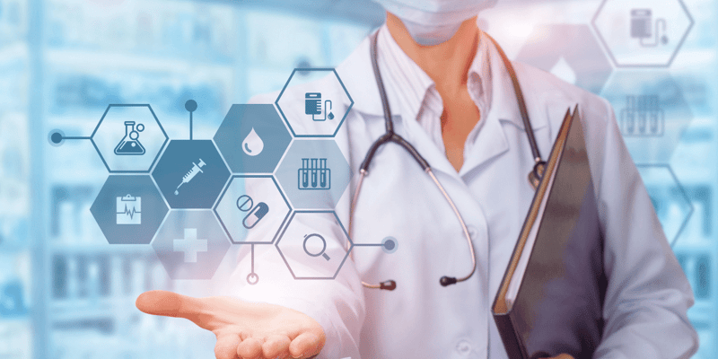 Medical professional with a digital interface of medical icons.